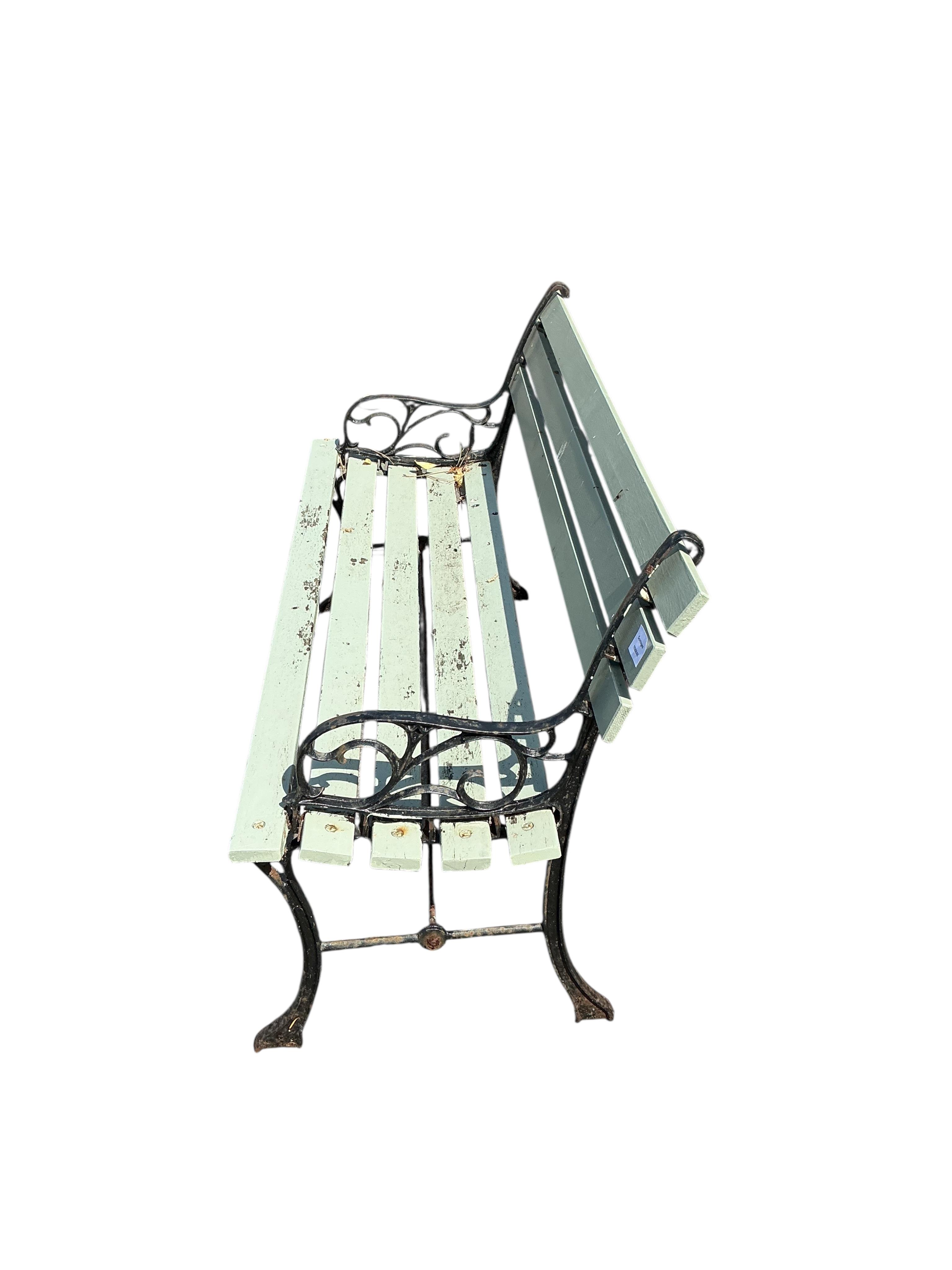 A cast metal slatted wood garden bench, width 122cm, depth 48cm, height 68cm